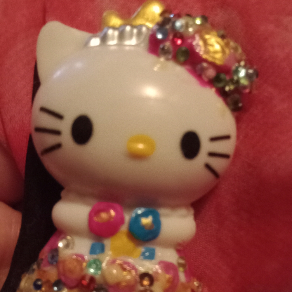 Colorful Hello Kitty Figurine Pre-owned.
